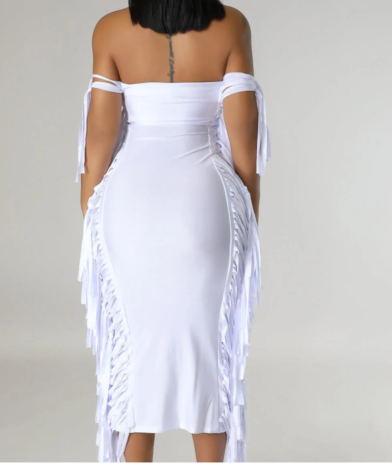 A LITTLE FRINGING AROUND DRESS